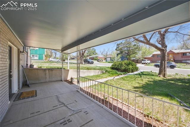 1636 Shenandoah Dr, Colorado Springs, CO 80910 - view of patio with a porch and a residential view
