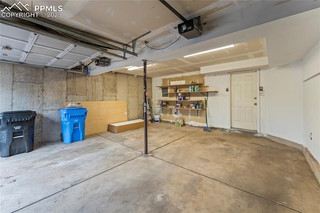 garage featuring a garage door opener