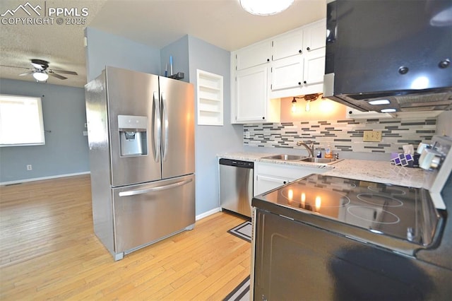 632 Rye Ridge Rd, Fountain, CO 80817 - kitchen featuring appliances with stainless steel finishes, a sink, backsplash, a ceiling fan, and baseboards
