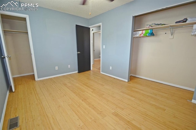 632 Rye Ridge Rd, Fountain, CO 80817 - unfurnished bedroom with wood finished floors, a closet, and baseboards