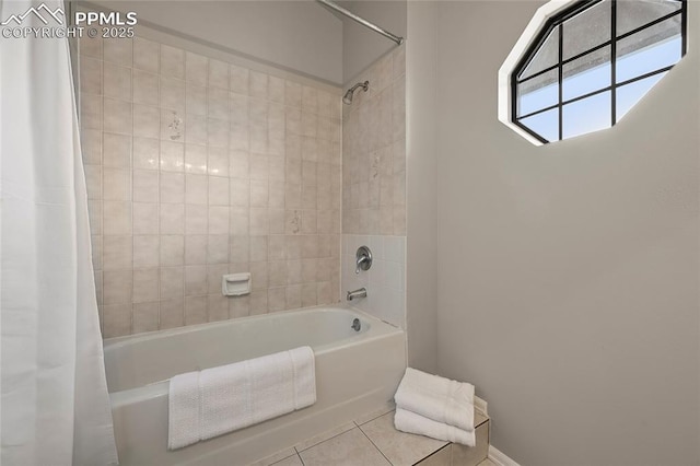 bathroom with tile patterned flooring, shower / bath combo, and baseboards