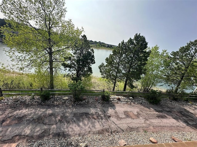 1769 Woodmoor Dr, Monument, CO 80132 - view of patio with a water view