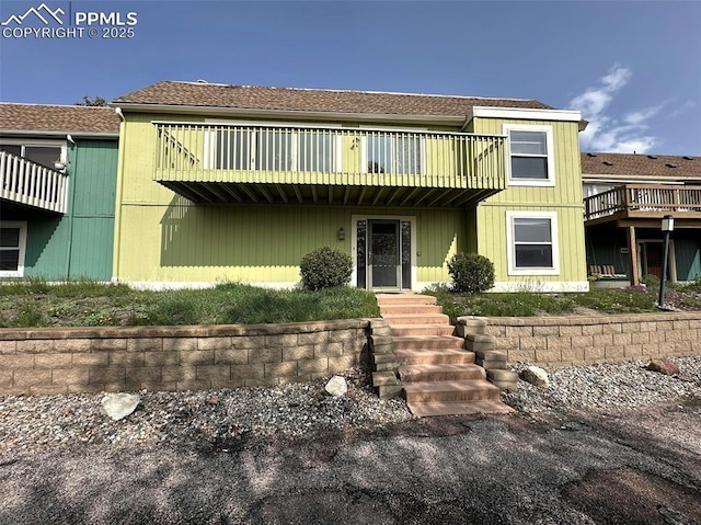 1769 Woodmoor Dr, Monument, CO 80132 - view of property featuring a balcony