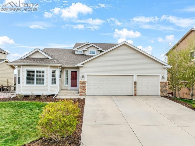 view of front of property featuring concrete driveway, a garage, a shingled roof, and a front yard