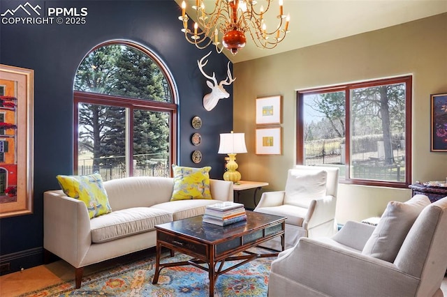 3285 El Pomar Rd, Colorado Springs, CO 80906 - living room featuring a chandelier