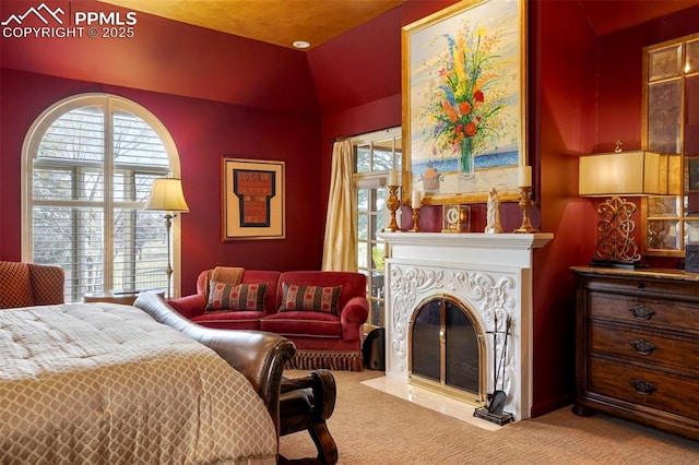 3285 El Pomar Rd, Colorado Springs, CO 80906 - bedroom featuring carpet flooring, multiple windows, and a fireplace with flush hearth