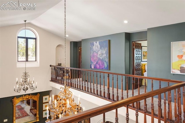 3285 El Pomar Rd, Colorado Springs, CO 80906 - hall with a chandelier, lofted ceiling, arched walkways, stairway, and recessed lighting