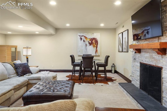 3285 El Pomar Rd, Colorado Springs, CO 80906 - living area featuring recessed lighting, a fireplace, carpet flooring, and baseboards