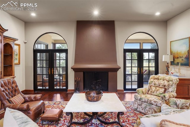 3285 El Pomar Rd, Colorado Springs, CO 80906 - living room featuring french doors, wood finished floors, and recessed lighting