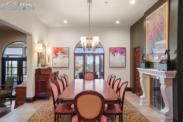3285 El Pomar Rd, Colorado Springs, CO 80906 - dining space featuring french doors, healthy amount of natural light, recessed lighting, a chandelier, and baseboards