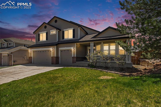 1828 Aquamarine Ct, Castle Rock, CO 80108 - view of front of property featuring an attached garage, a porch, brick siding, concrete driveway, and a front yard