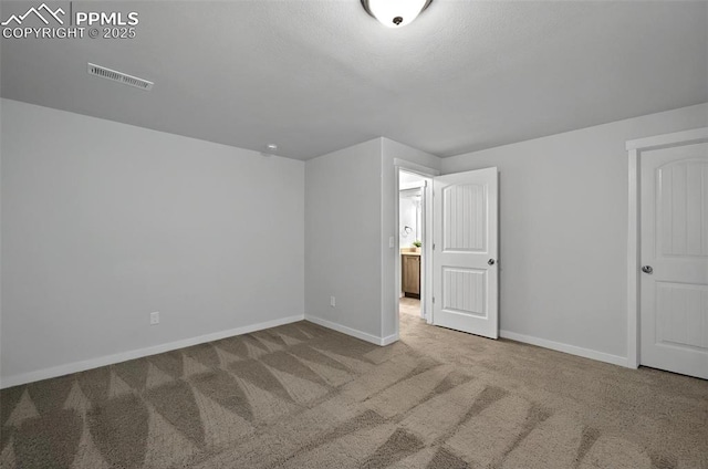 additional living space with carpet flooring and baseboards