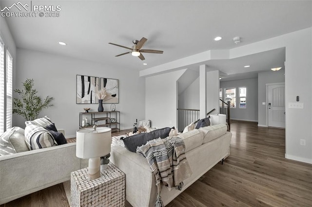 living area featuring ceiling fan, wood finished floors, recessed lighting, baseboards, and stairs