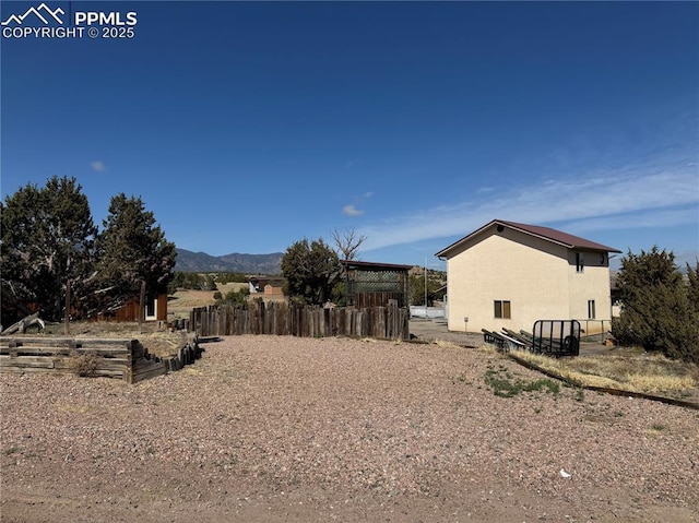 110 Yucca Ave, Florence, CO 81226 - view of yard with fence and a mountain view