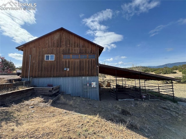 110 Yucca Ave, Florence, CO 81226 - view of outdoor structure featuring an exterior structure, an outdoor structure, and a mountain view