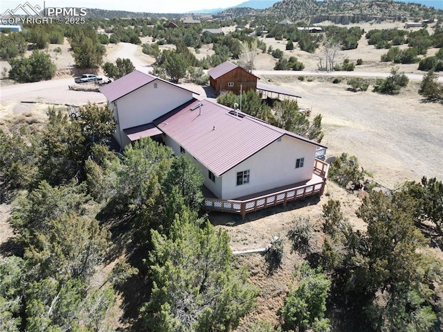 110 Yucca Ave, Florence, CO 81226 - aerial view of property and surrounding area with a mountain backdrop