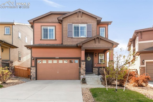 craftsman-style home featuring an attached garage, concrete driveway, stone siding, and fence