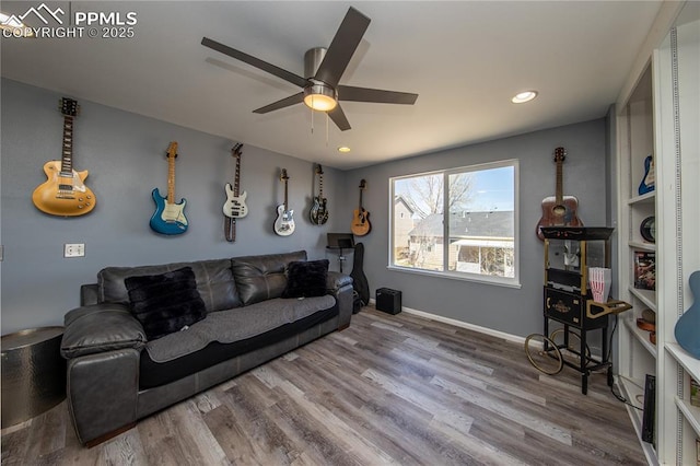 7511 Coffee Rd, Peyton, CO 80831 - living room with ceiling fan, wood finished floors, baseboards, and recessed lighting