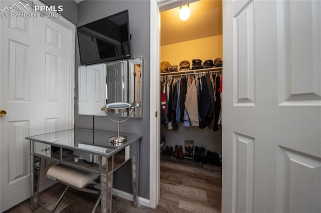 7511 Coffee Rd, Peyton, CO 80831 - spacious closet featuring wood finished floors