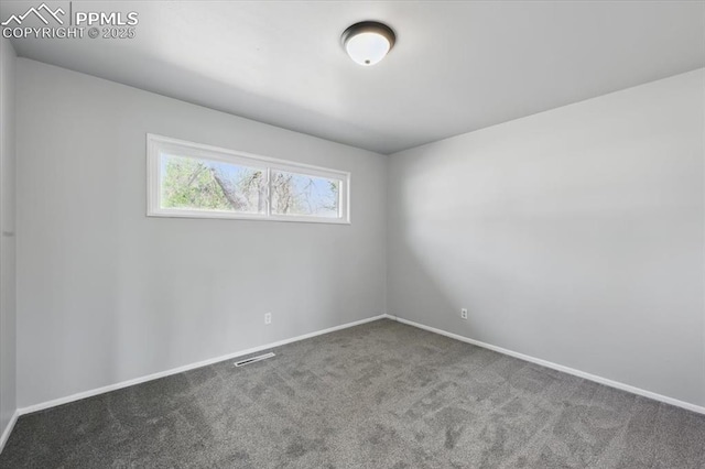308 Steven Dr, Colorado Springs, CO 80911 - carpeted empty room with baseboards