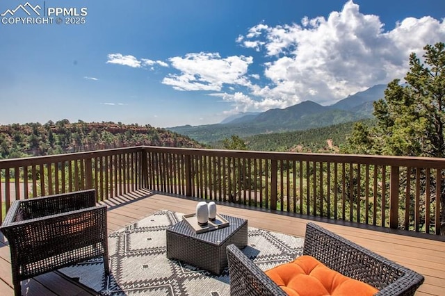 2530 White Rock Ln, Colorado Springs, CO 80904 - wooden terrace with a mountain view