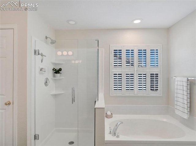 2209 Gilpin Ave, Colorado Springs, CO 80910 - bathroom featuring a shower stall and a garden tub