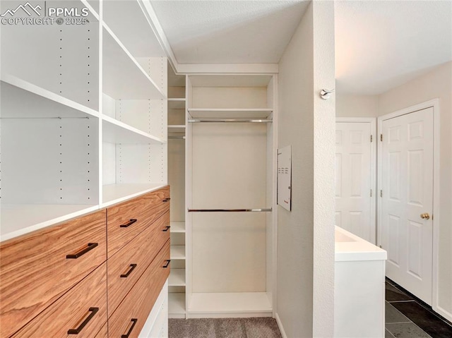 2209 Gilpin Ave, Colorado Springs, CO 80910 - spacious closet with dark tile patterned flooring