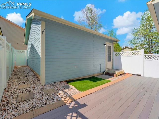 2209 Gilpin Ave, Colorado Springs, CO 80910 - wooden terrace with a fenced backyard