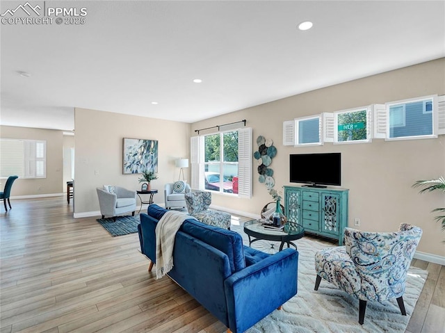 2209 Gilpin Ave, Colorado Springs, CO 80910 - living area featuring light wood-style floors, recessed lighting, and baseboards