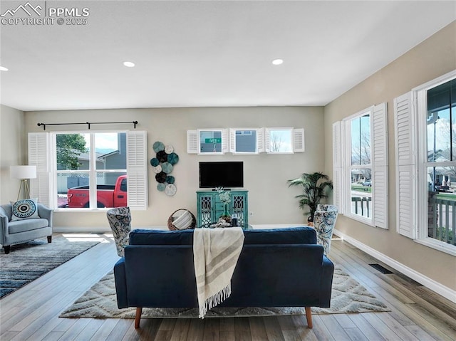 2209 Gilpin Ave, Colorado Springs, CO 80910 - living room with hardwood / wood-style flooring, baseboards, and recessed lighting