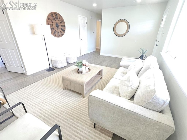 910 Dunston St, Colorado Springs, CO 80907 - living room featuring wood finished floors, baseboards, and recessed lighting