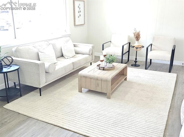 910 Dunston St, Colorado Springs, CO 80907 - living area with wood finished floors and baseboards