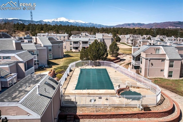 3425 Rebecca Ln Unit H, Colorado Springs, CO 80917 - aerial perspective of suburban area featuring a mountain backdrop