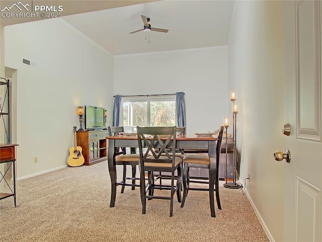 3425 Rebecca Ln Unit H, Colorado Springs, CO 80917 - carpeted dining space with ceiling fan, baseboards, and a towering ceiling
