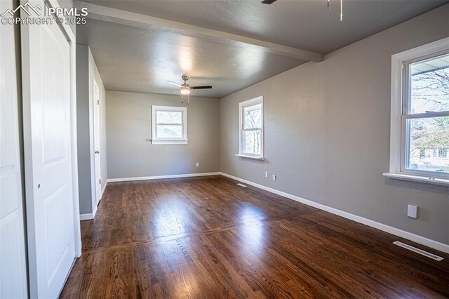 1701 Grant Ave, Colorado Springs, CO 80909 - empty room featuring ceiling fan, dark wood-style floors, and baseboards