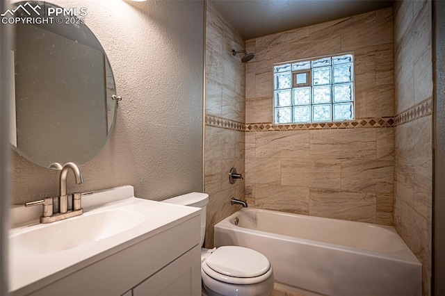 1701 Grant Ave, Colorado Springs, CO 80909 - full bath featuring toilet, a textured wall, shower / bath combination, and vanity