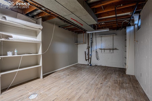 1701 Grant Ave, Colorado Springs, CO 80909 - unfinished below grade area featuring wood finished floors