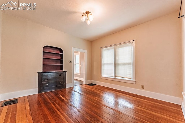 427 N Walnut St, Colorado Springs, CO 80907 - empty room with hardwood / wood-style floors and baseboards
