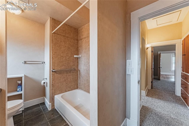 427 N Walnut St, Colorado Springs, CO 80907 - bathroom with toilet, shower / bathtub combination, baseboards, and tile patterned floors