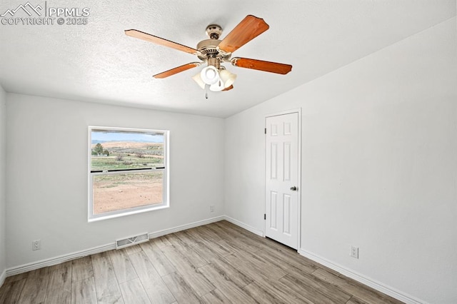 9775 Indian Village Hts, Fountain, CO 80817 - spare room with wood finished floors, baseboards, and a ceiling fan