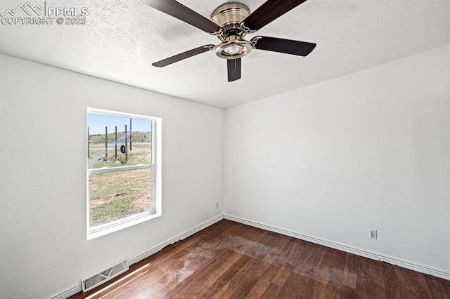 9775 Indian Village Hts, Fountain, CO 80817 - unfurnished room with dark wood-style floors, baseboards, and a ceiling fan