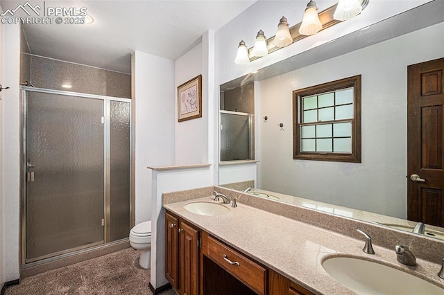 7210 Antelope Ln, Colorado Springs, CO 80920 - full bathroom with toilet, double vanity, and a shower stall