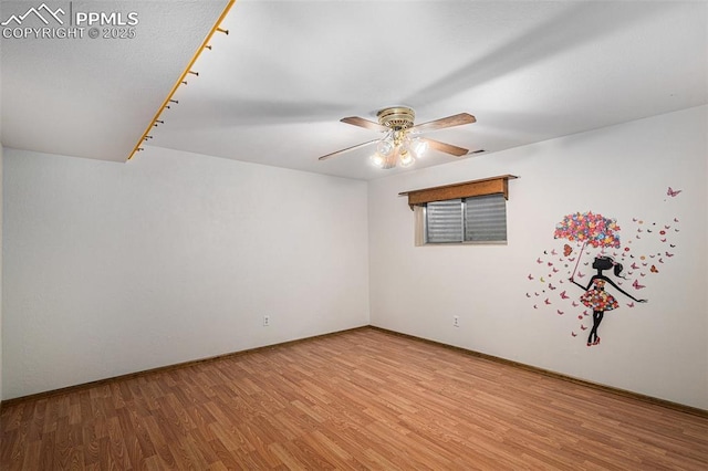 7210 Antelope Ln, Colorado Springs, CO 80920 - unfurnished room featuring wood finished floors, ceiling fan, and baseboards