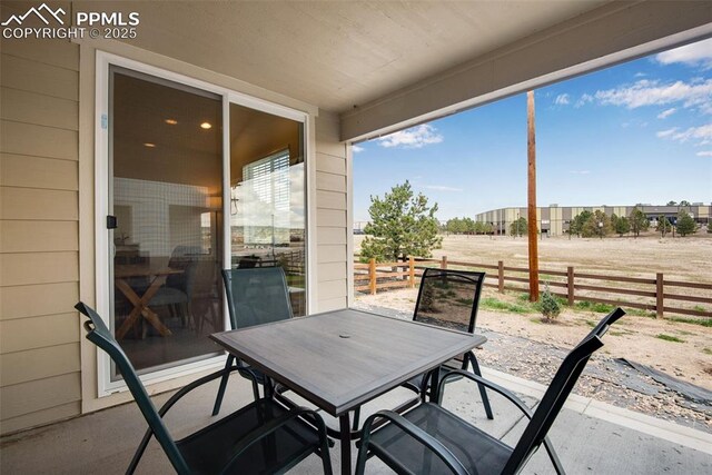 16470 Mountain Flax Dr, Monument, CO 80132 - view of patio / terrace featuring fence and outdoor dining area