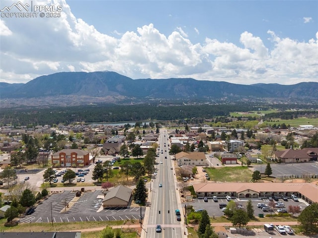 16470 Mountain Flax Dr, Monument, CO 80132 - drone / aerial view of a mountain backdrop