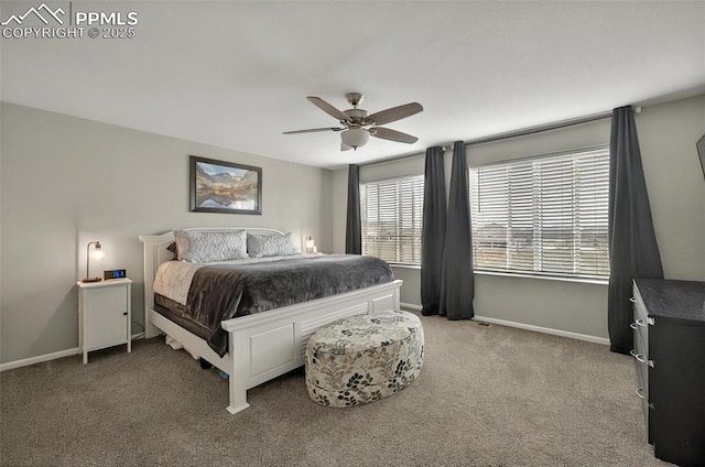 carpeted bedroom with baseboards and a ceiling fan
