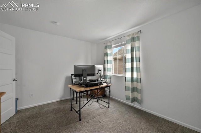 carpeted office featuring baseboards