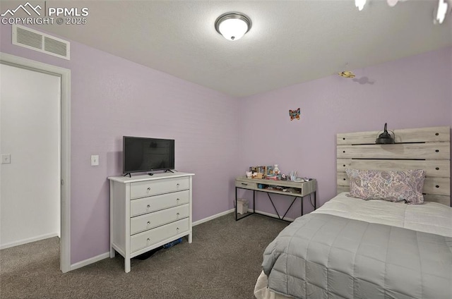 bedroom featuring carpet and baseboards