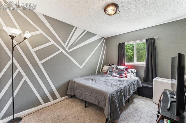 604 Blossom Field Rd, Fountain, CO 80817 - bedroom featuring carpet flooring, a textured ceiling, and a textured wall