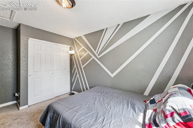604 Blossom Field Rd, Fountain, CO 80817 - carpeted bedroom featuring a textured ceiling and baseboards